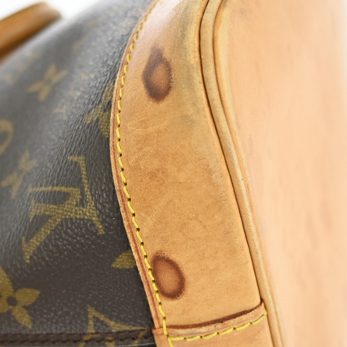 Louis Vuitton Alma Handbag Monogram Canvas Brown Canvas Handbag (Pre-Owned)