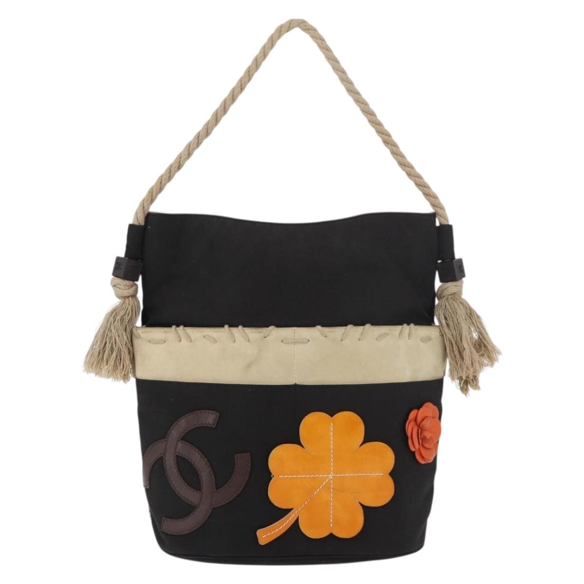 Chanel Camellia Shoulderbag Canvas Black Canvas Shoulder Bag Bag (Pre-Owned)