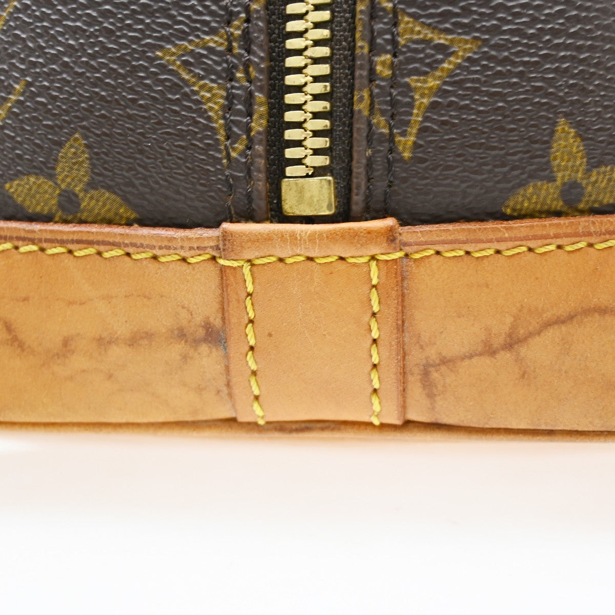 Louis Vuitton Alma Handbag Monogram Canvas Brown Canvas Handbag (Pre-Owned)