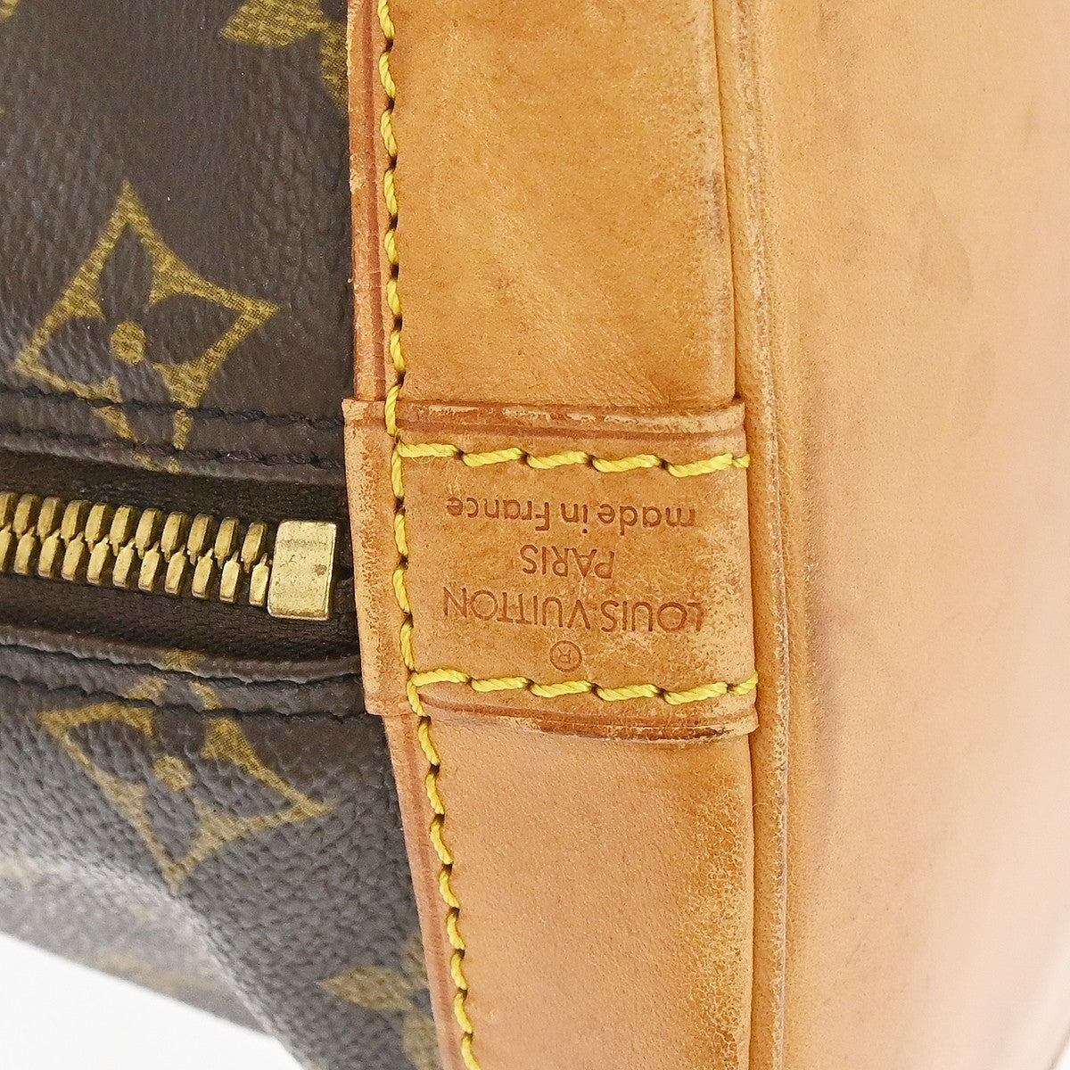 Louis Vuitton Alma Handbag Monogram Canvas Brown Canvas Handbag (Pre-Owned)