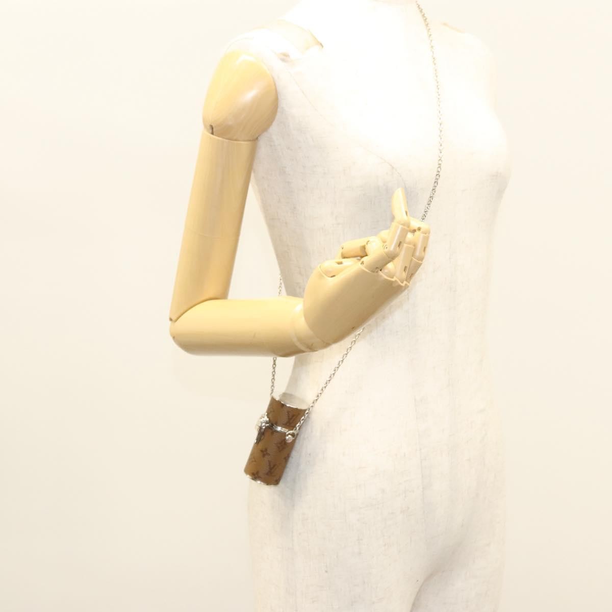 Louis Vuitton Lipstick Case On Chain Reverse Monogram Canvas Brown Canvas Clutche & Pouche Bag (Pre-Owned)