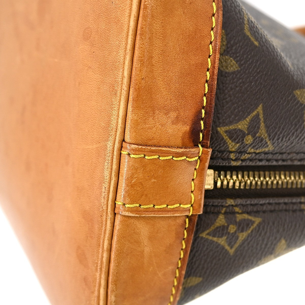 Louis Vuitton Alma Handbag Monogram Canvas Brown Canvas Handbag (Pre-Owned)