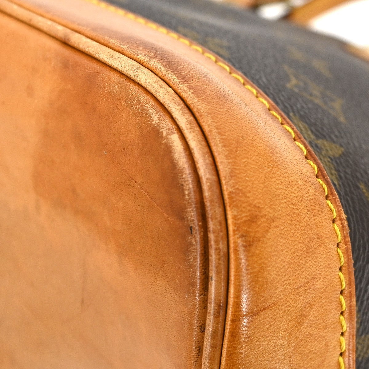 Louis Vuitton Alma Handbag Monogram Canvas Brown Canvas Handbag (Pre-Owned)