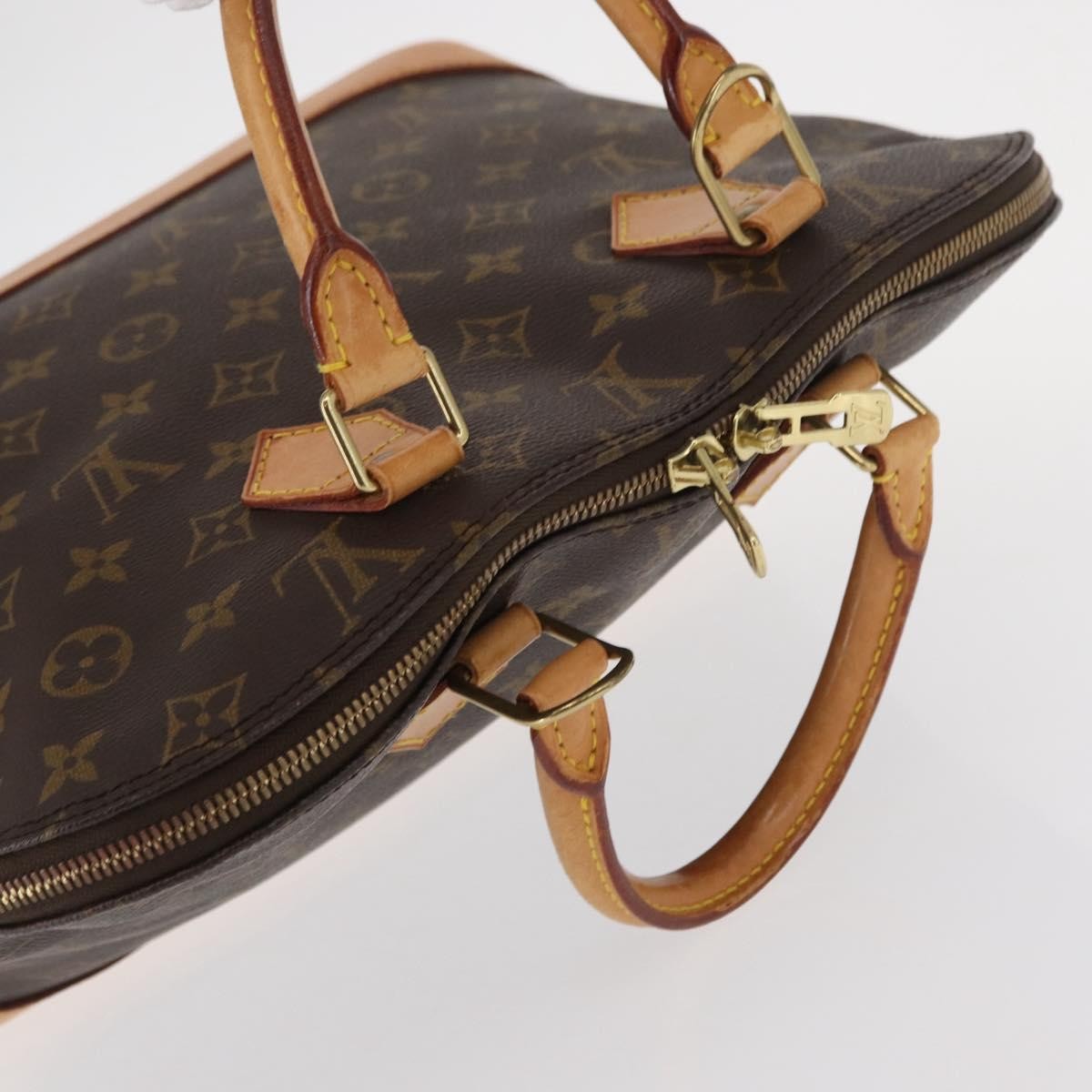 Louis Vuitton Alma Handbag Monogram Canvas Brown Canvas Handbag (Pre-Owned)