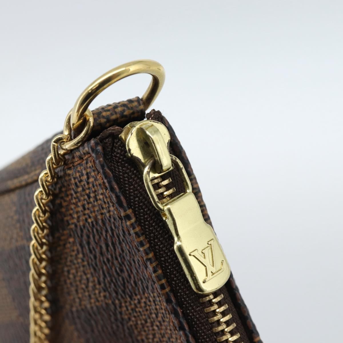 Louis Vuitton Mini Pochette Accessoires Damier Canvas Brown Canvas Clutche & Pouche Bag (Pre-Owned)