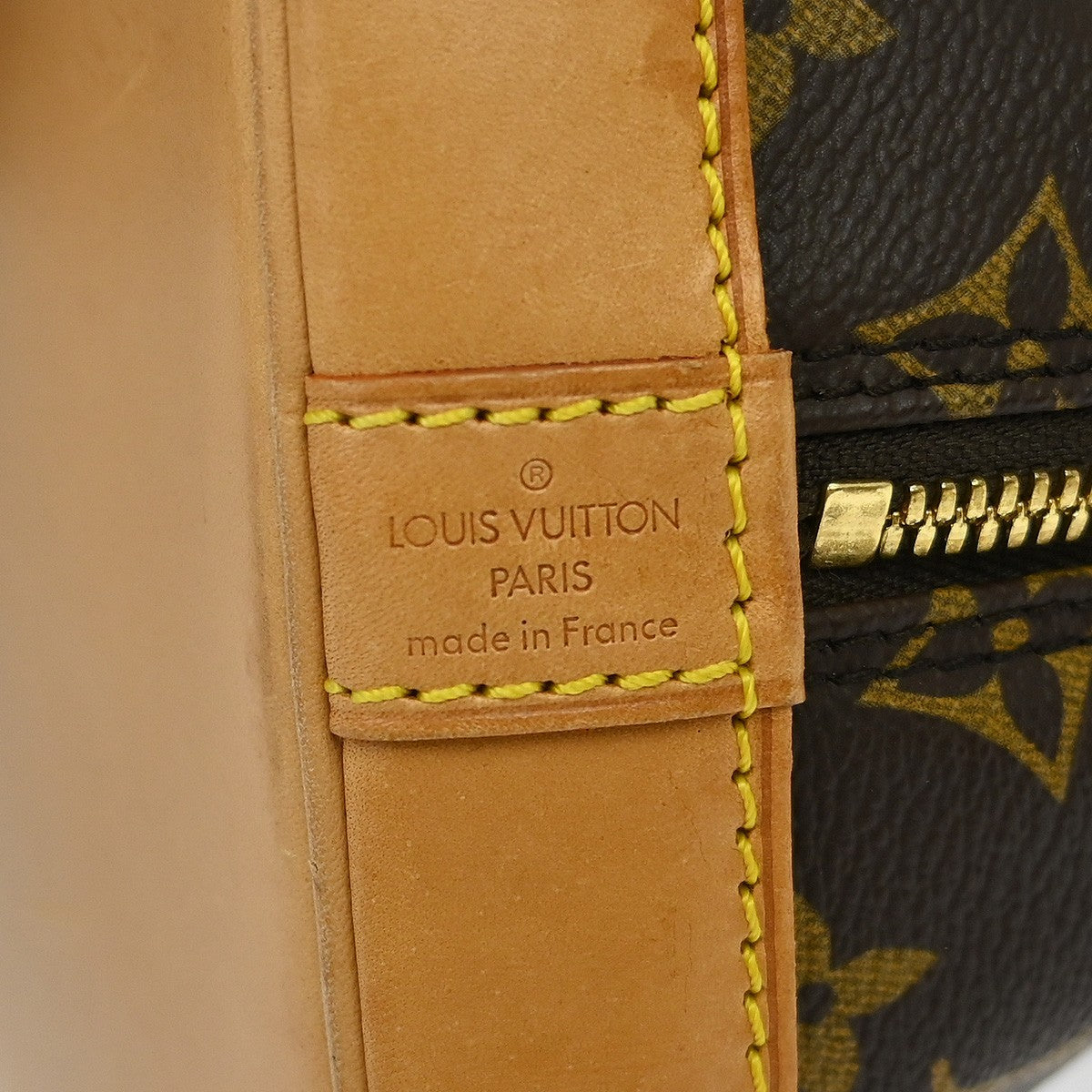Louis Vuitton Alma Handbag Monogram Canvas Brown Canvas Handbag (Pre-Owned)