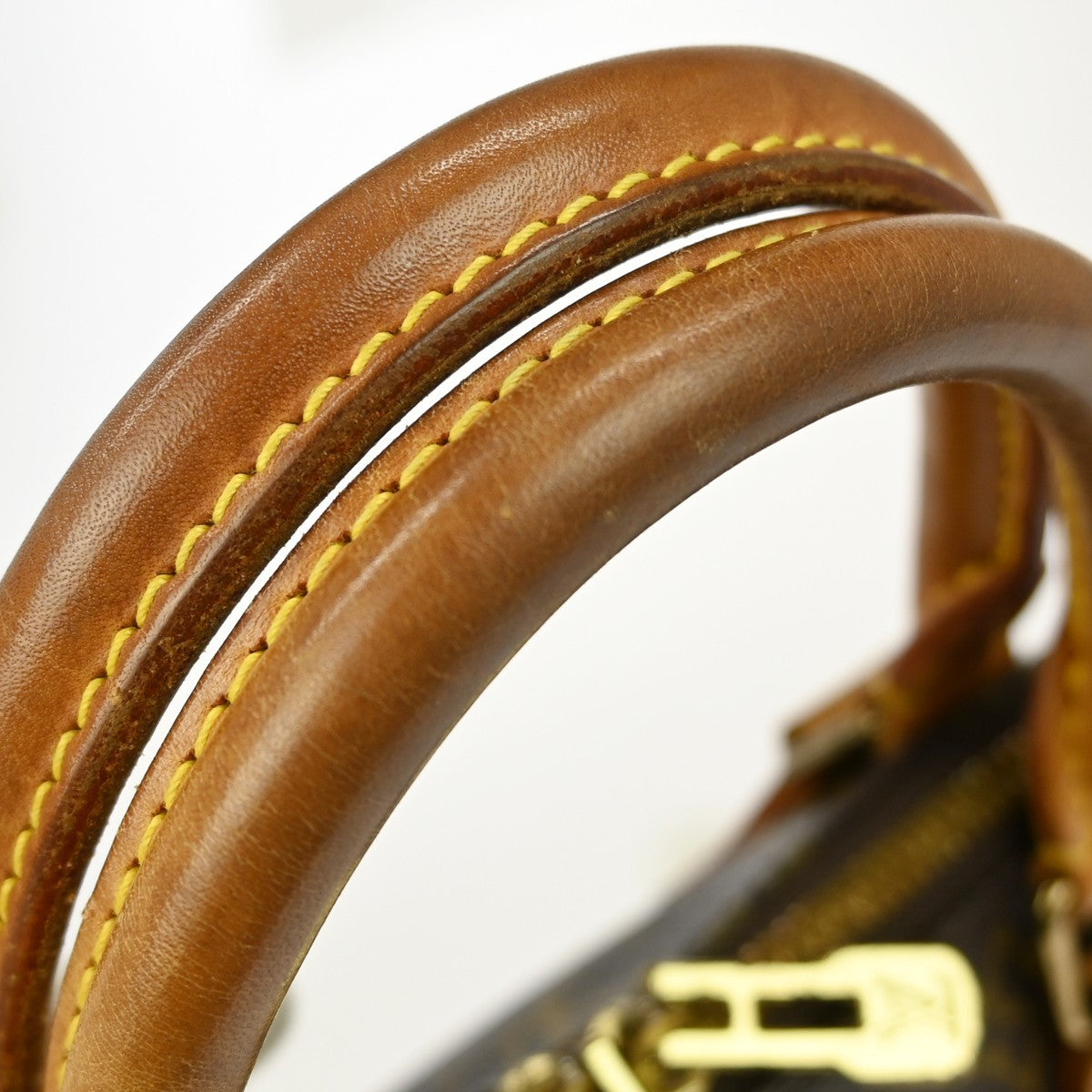 Louis Vuitton Alma Handbag Monogram Canvas Brown Canvas Handbag (Pre-Owned)
