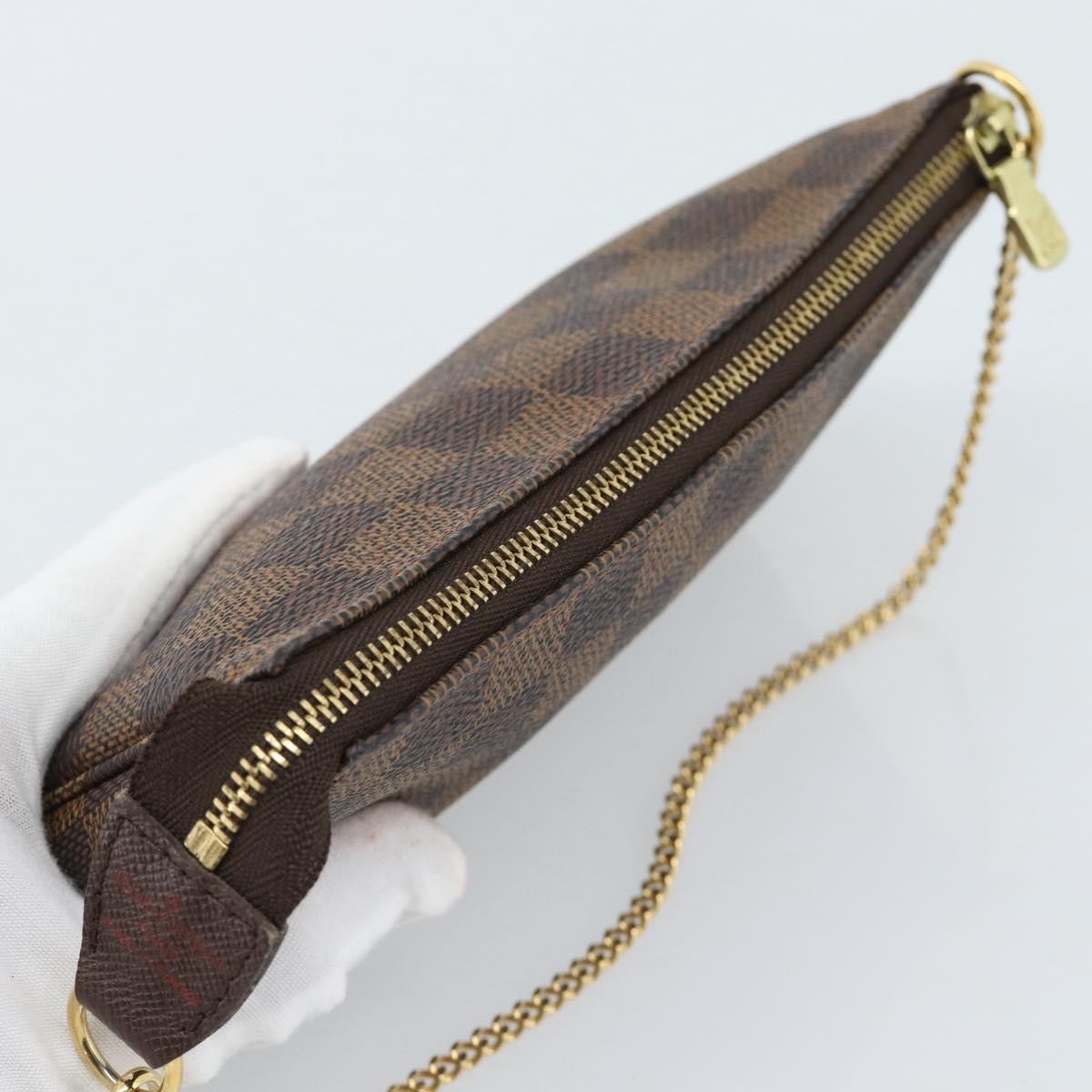 Louis Vuitton Mini Pochette Accessoires Damier Canvas Brown Canvas Clutche & Pouche Bag (Pre-Owned)