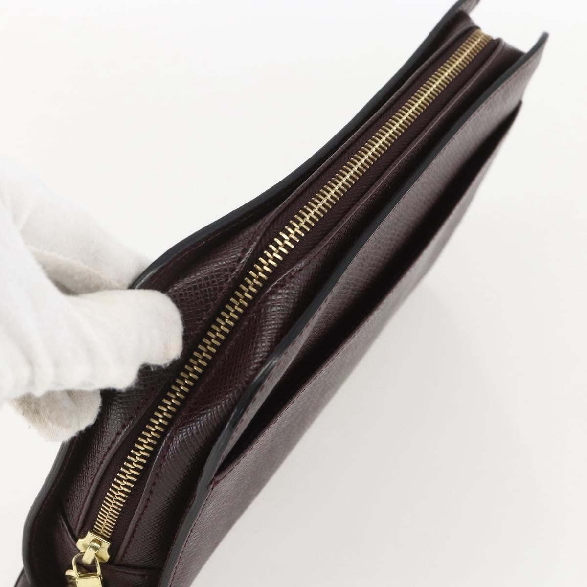 Louis Vuitton Pochette Baikal Clutch Taiga Leather Brown Leather Clutche & Pouche Bag (Pre-Owned)