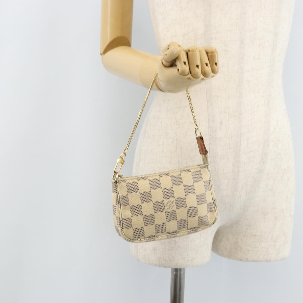Louis Vuitton Mini Pochette Accessoires Damier Canvas Multicolour Canvas Clutche & Pouche Bag (Pre-Owned)