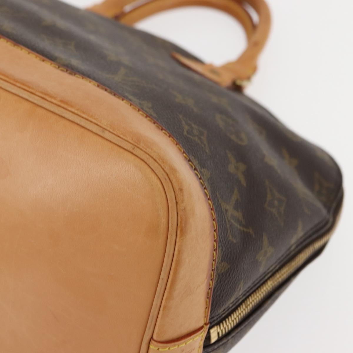 Louis Vuitton Alma Handbag Monogram Canvas Brown Canvas Handbag (Pre-Owned)