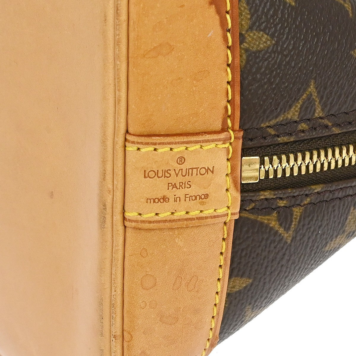 Louis Vuitton Alma Handbag Monogram Canvas Brown Canvas Handbag (Pre-Owned)