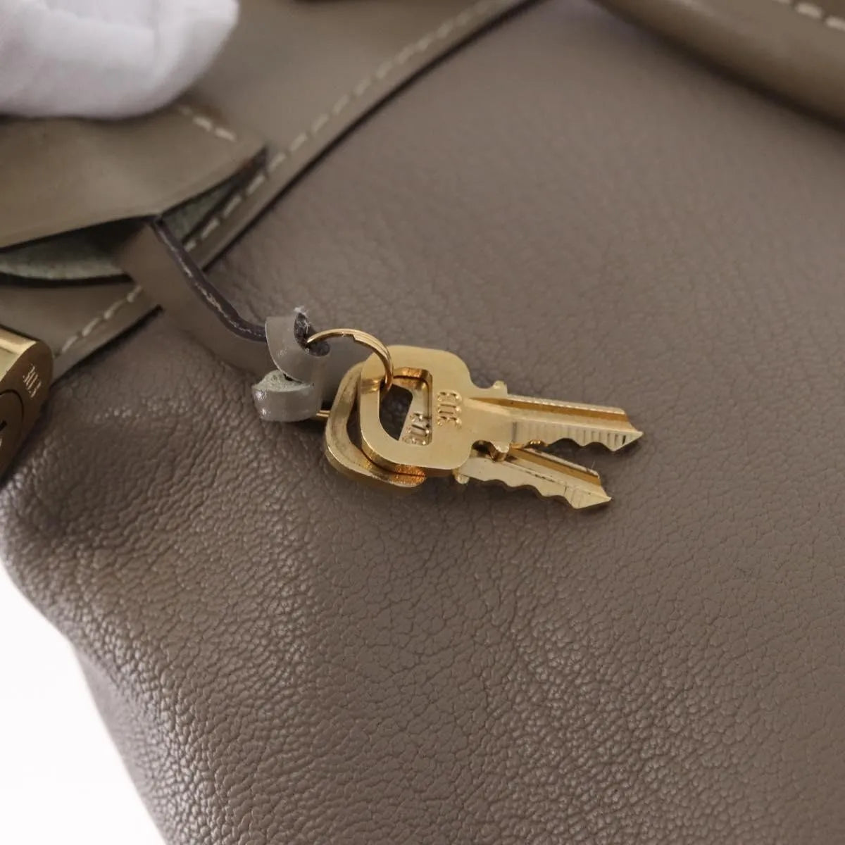 Louis Vuitton Suhali Lockit Leather Gray Leather Handbag (Pre-Owned)