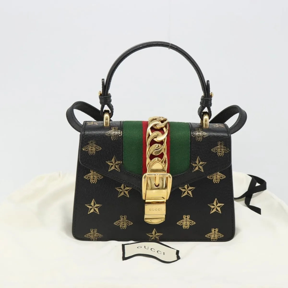 Gucci Sylvie Top Handle Printed Leather Black Leather Handbag (Pre-Owned)