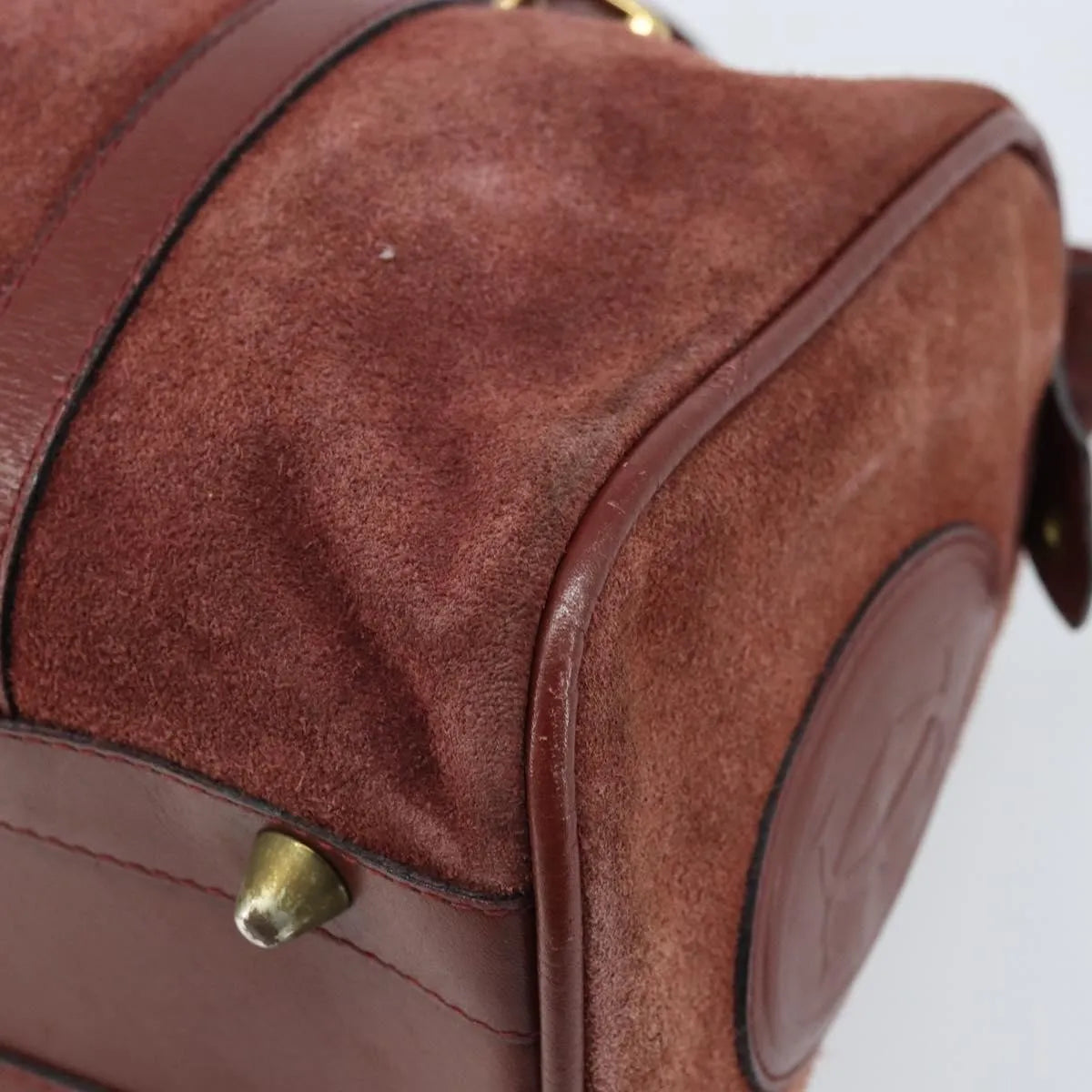 Cartier Must De Cartier Suede Burgundy Suede Handbag (Pre-Owned)