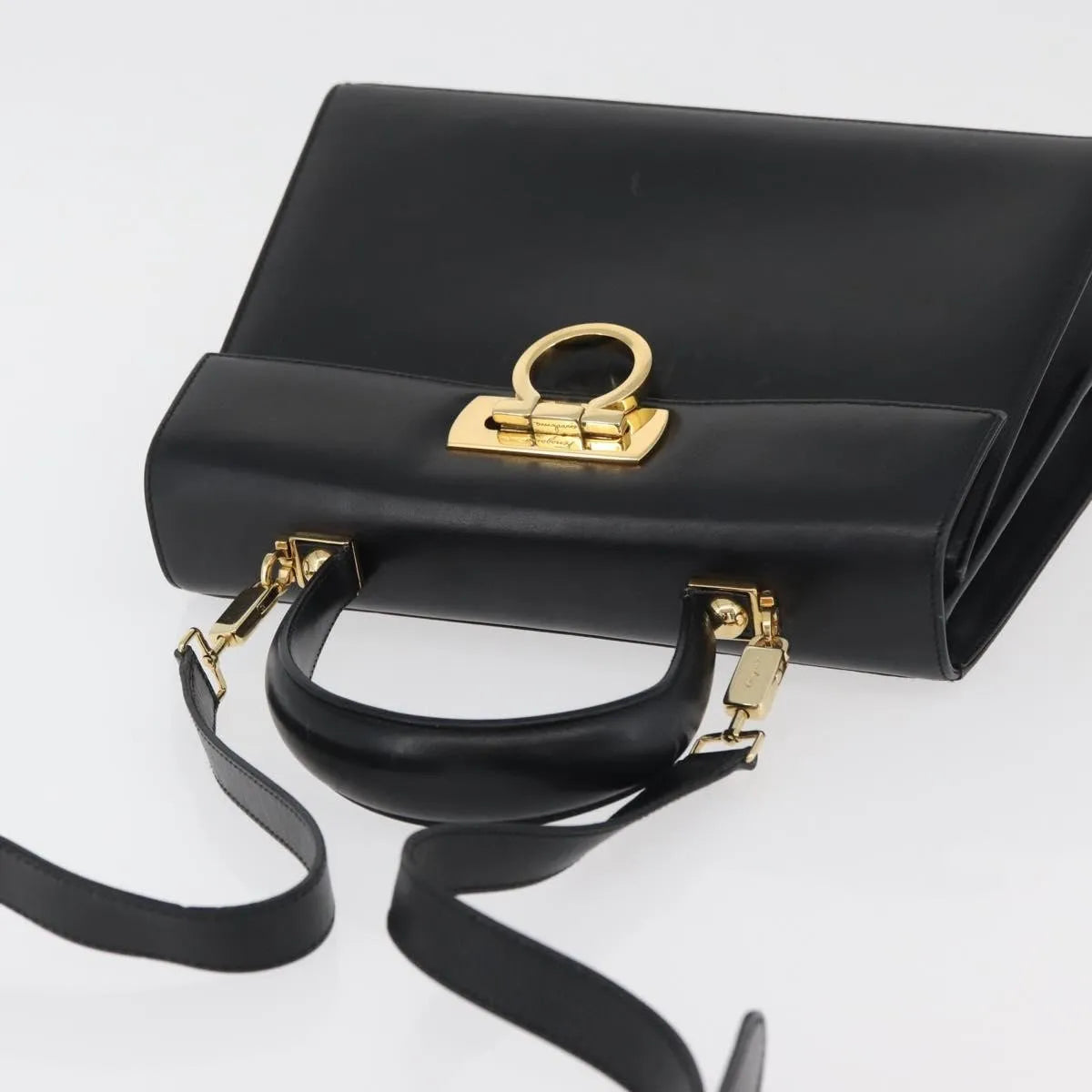 Salvatore Ferragamo Convertible Top Handle Leather Black Leather Handbag (Pre-Owned)