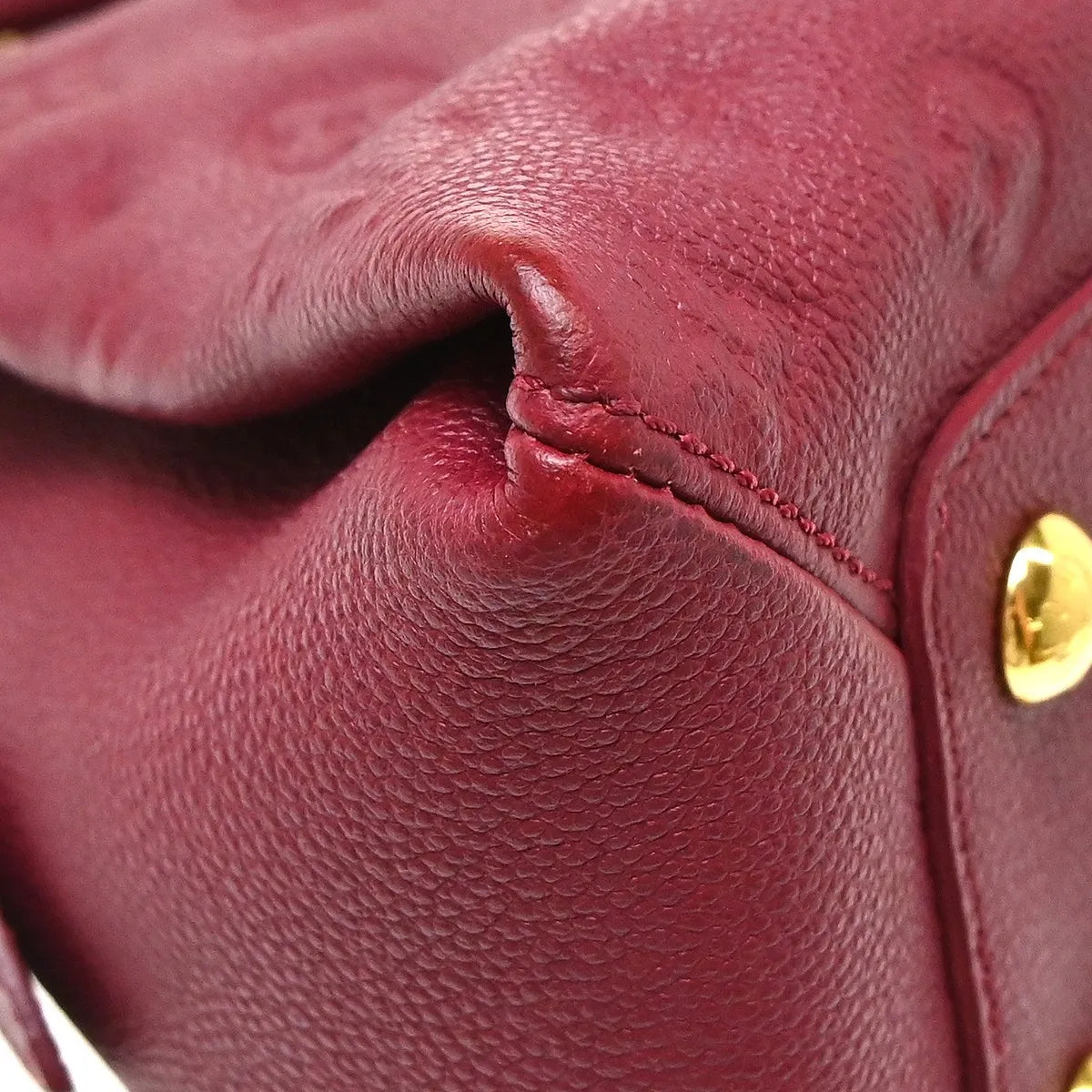 Louis Vuitton Vosges Whipstitch Monogram Empreinte Leather Burgundy Leather Handbag (Pre-Owned)