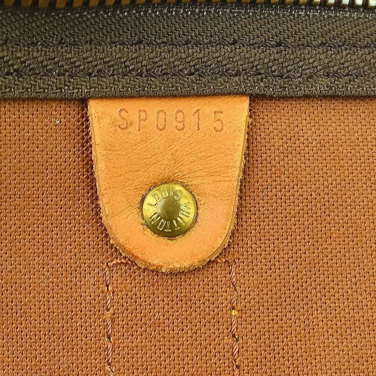 Louis Vuitton Keepall Monogram Canvas Brown Canvas Travel Bag Bag (Pre-Owned)
