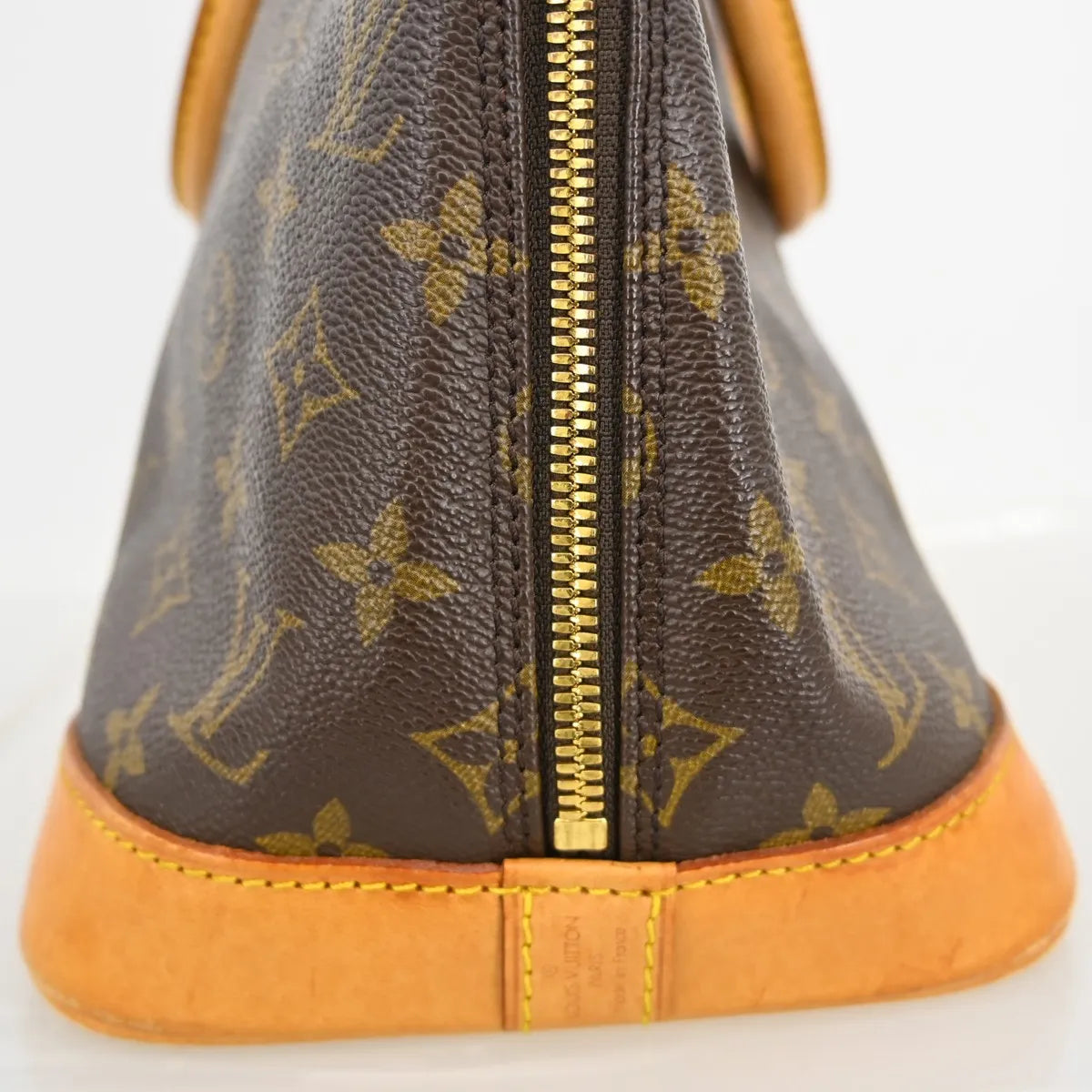 Louis Vuitton Alma Monogram Brown Canvas Handbag (Pre-Owned)