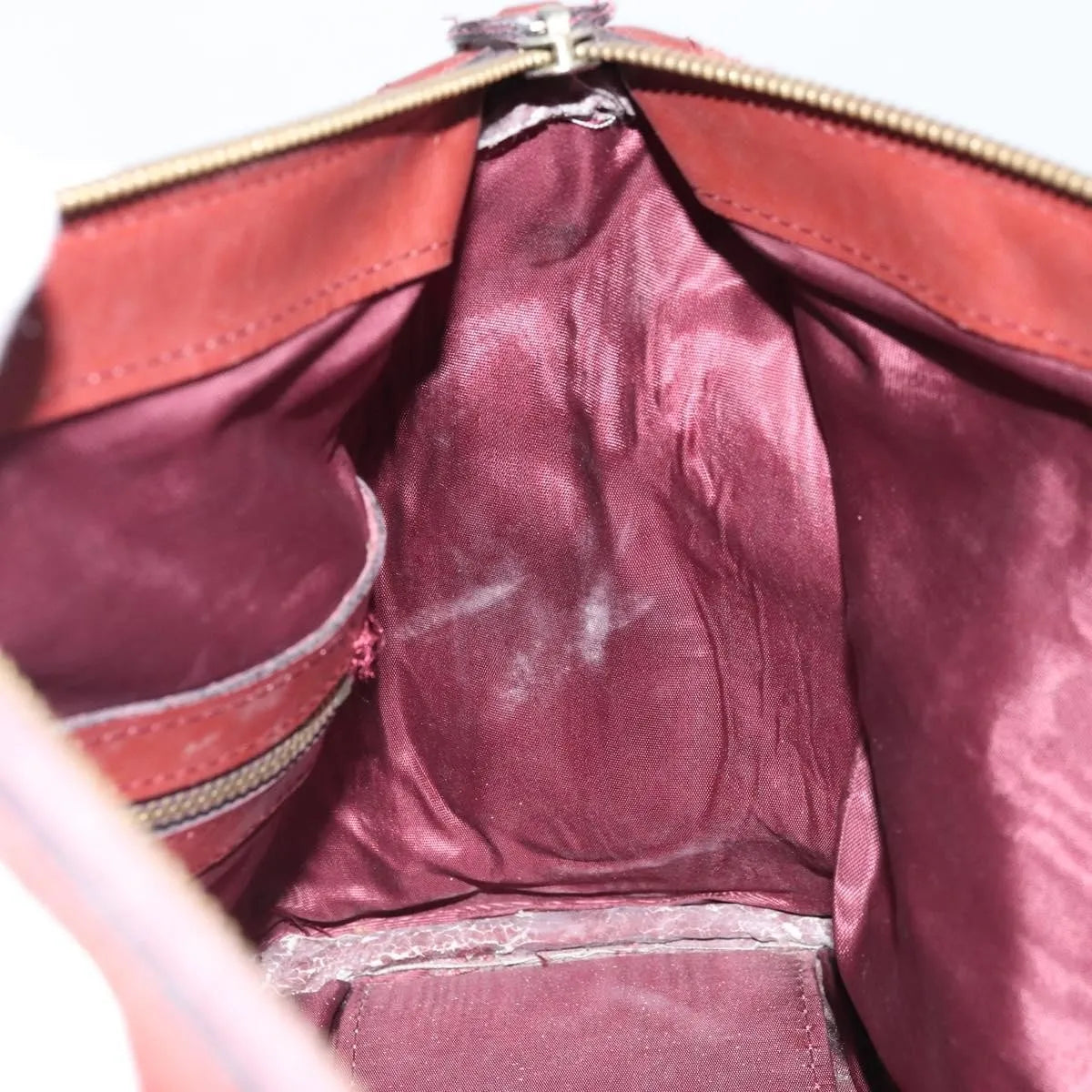 Cartier Must De Cartier Suede Burgundy Suede Handbag (Pre-Owned)