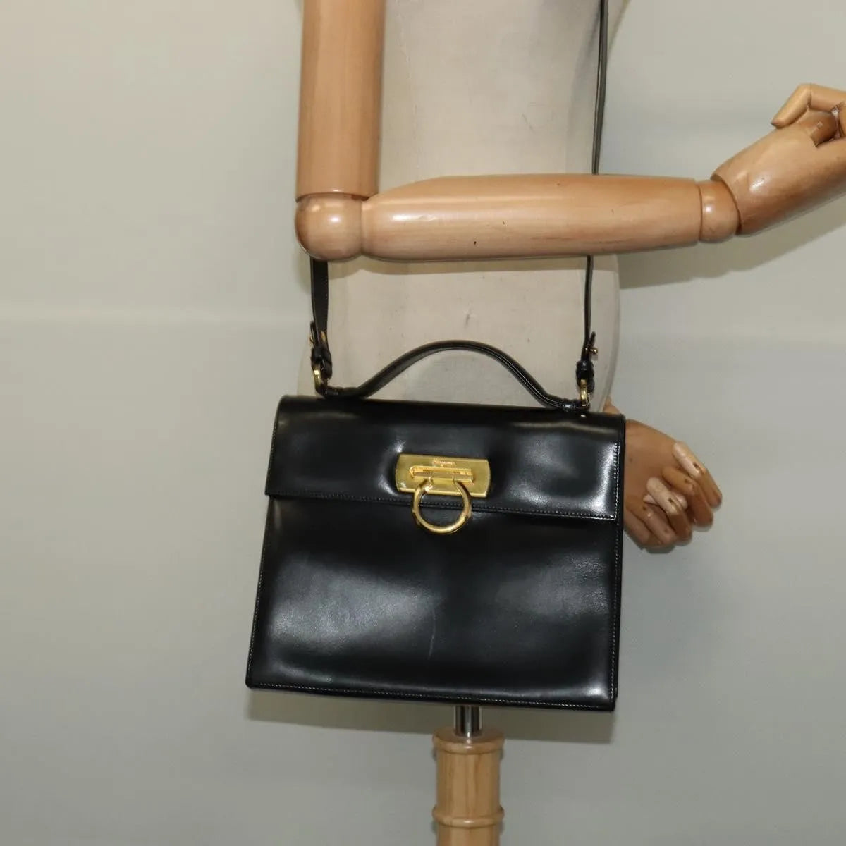 Salvatore Ferragamo Gancini Convertible Top Handle Leather Black Leather Handbag (Pre-Owned)
