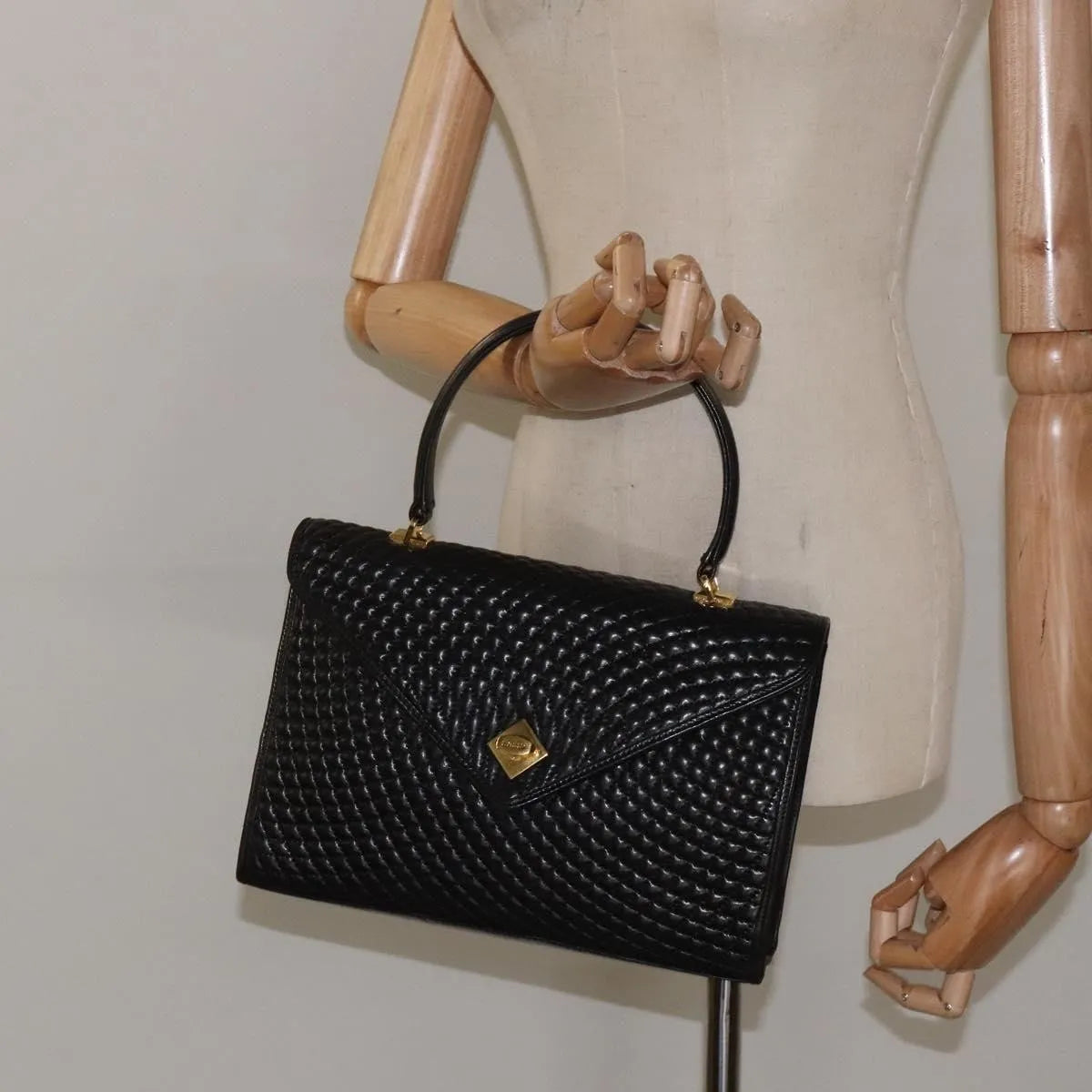 Bally Vintage Quilted Leather Black Leather Handbag (Pre-Owned)