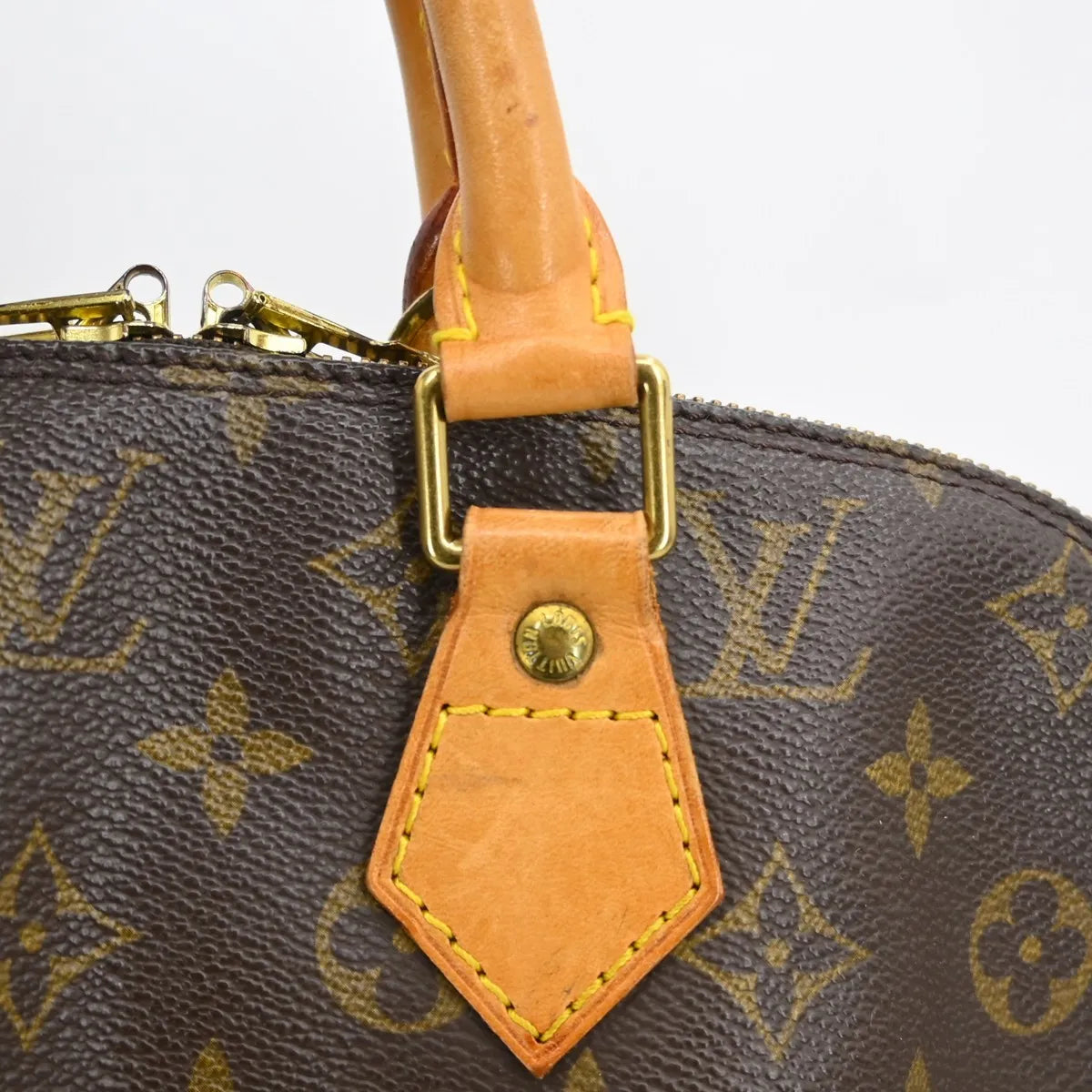Louis Vuitton Alma Monogram Brown Canvas Handbag (Pre-Owned)
