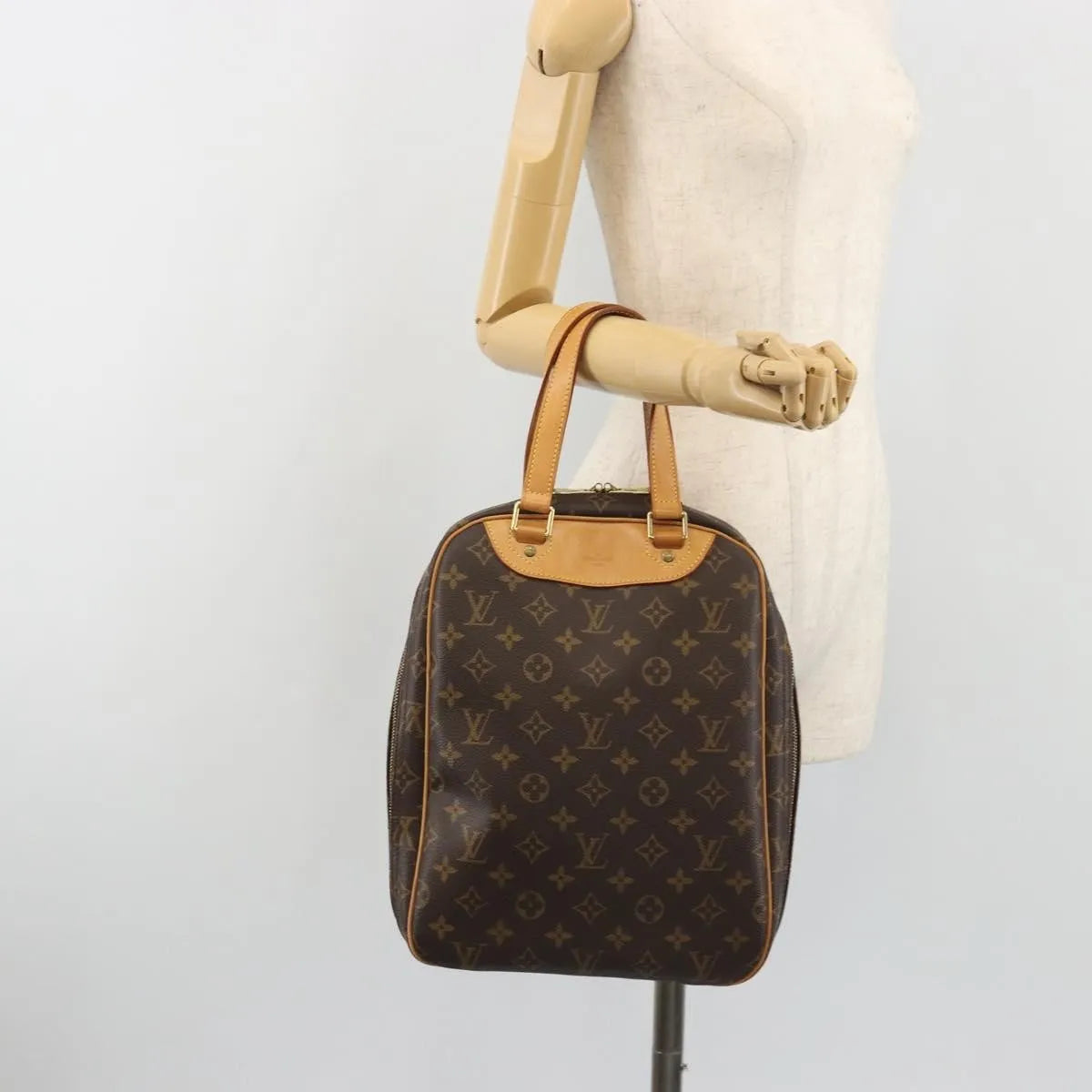 Louis Vuitton Excursion Monogram Brown Canvas Handbag (Pre-Owned)