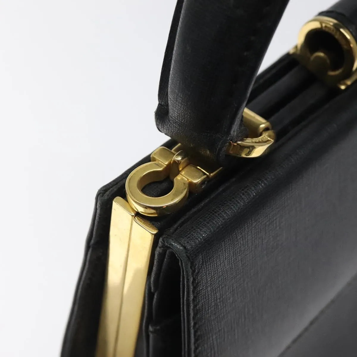 Salvatore Ferragamo Convertible Top Handle Leather Black Leather Handbag (Pre-Owned)