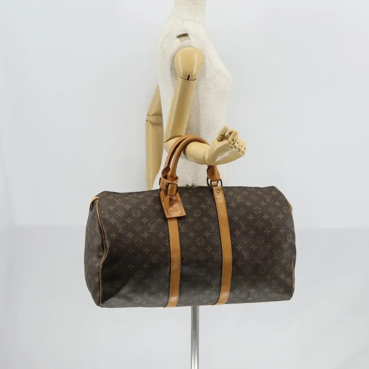 Louis Vuitton Keepall Monogram Canvas Brown Canvas Travel Bag Bag (Pre-Owned)