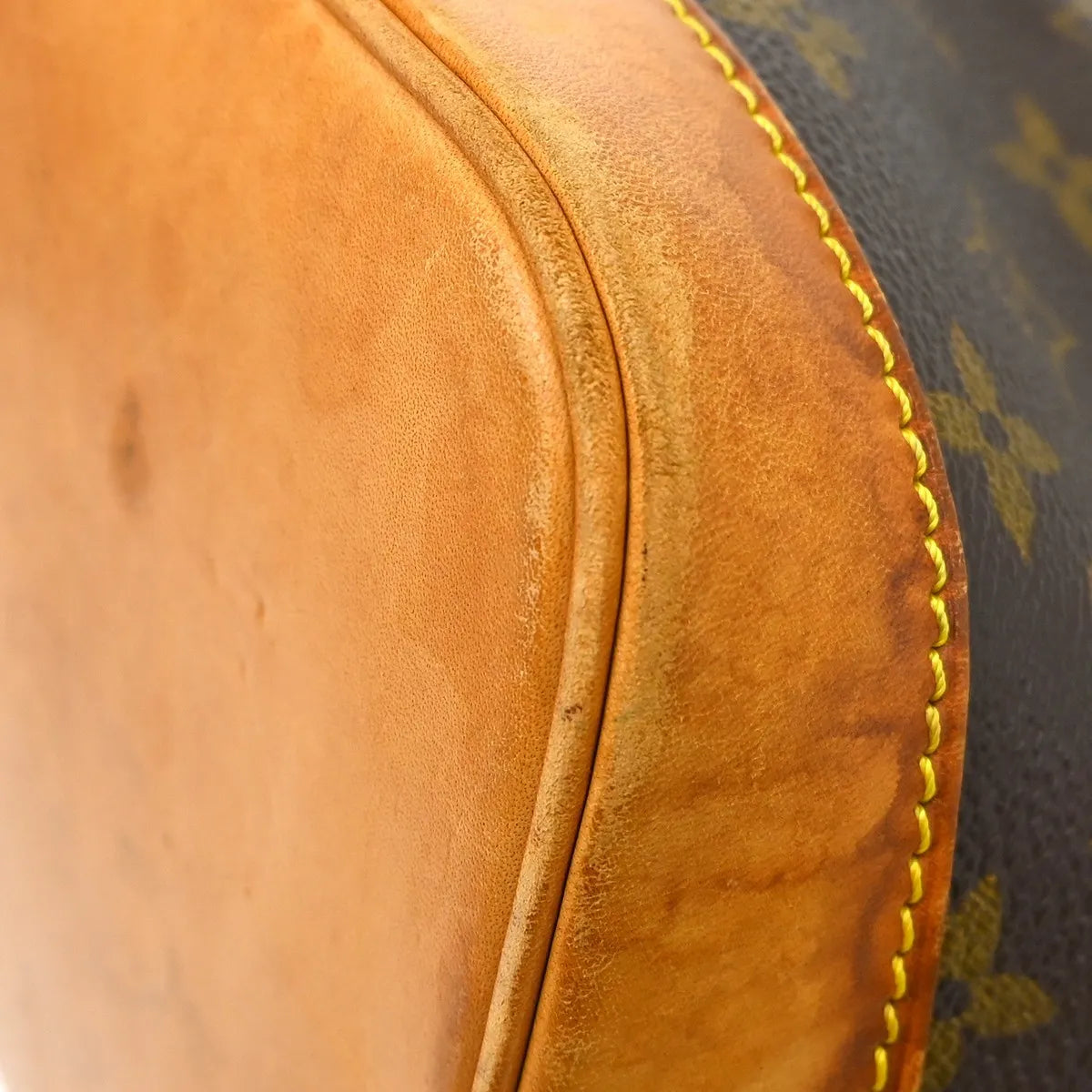 Louis Vuitton Alma Handbag Monogram Canvas Brown Canvas Handbag (Pre-Owned)