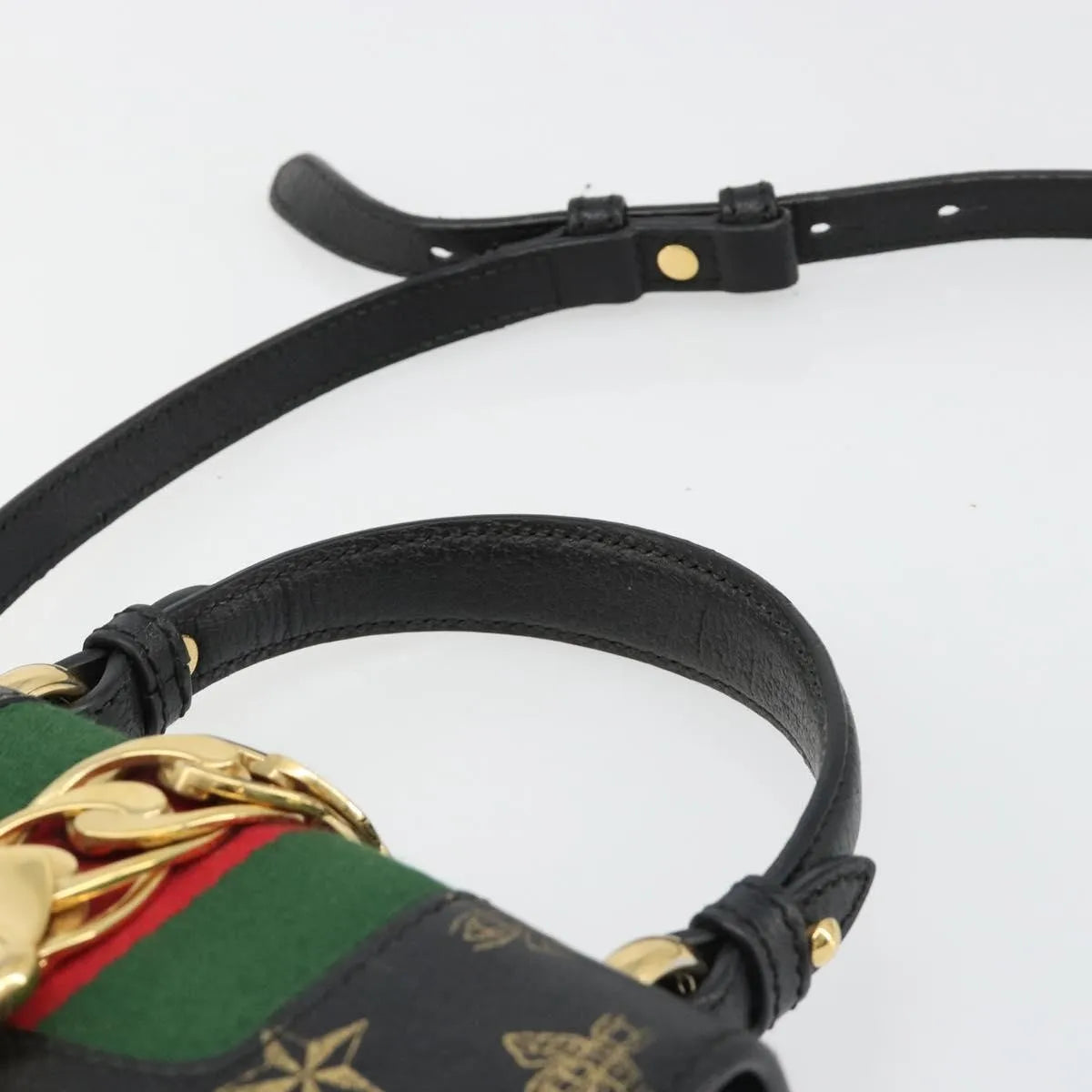 Gucci Sylvie Top Handle Printed Leather Black Leather Handbag (Pre-Owned)