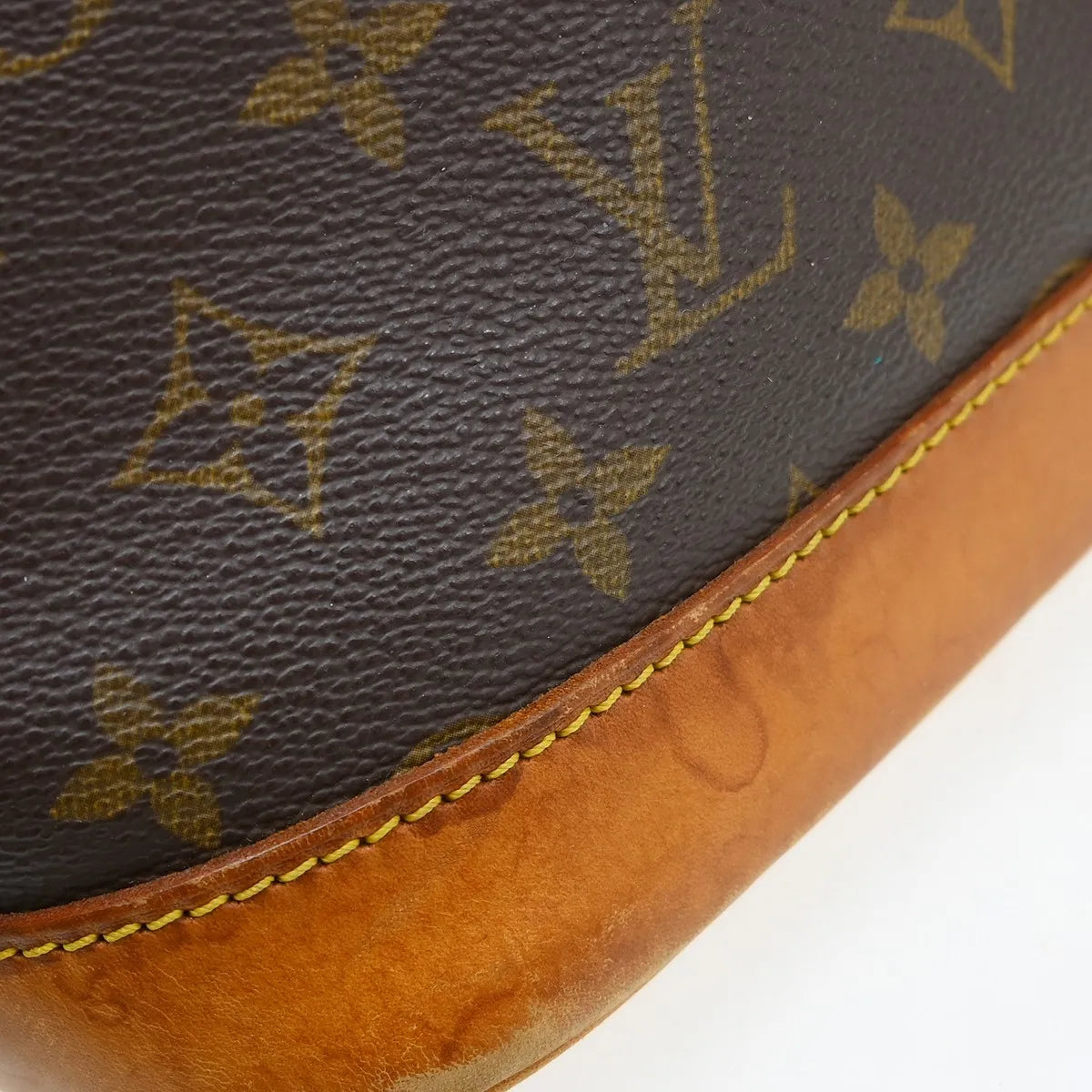 Louis Vuitton Alma Handbag Monogram Canvas Brown Canvas Handbag (Pre-Owned)