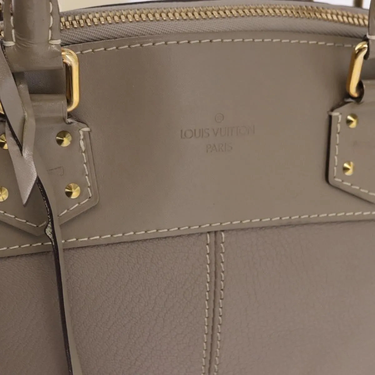 Louis Vuitton Suhali Lockit Leather Gray Leather Handbag (Pre-Owned)