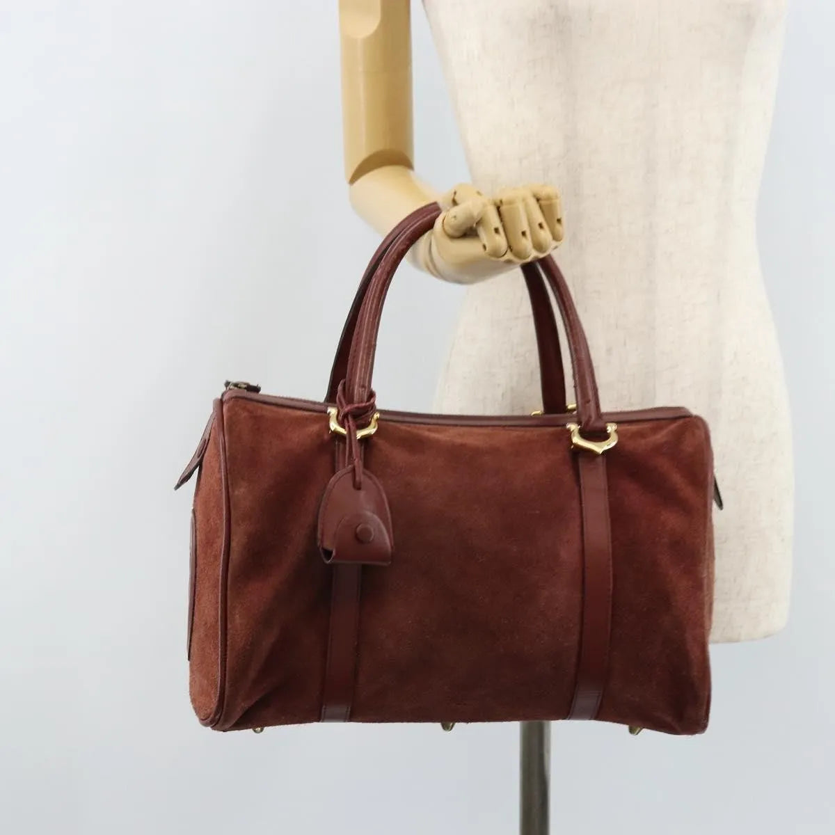 Cartier Must De Cartier Suede Burgundy Suede Handbag (Pre-Owned)