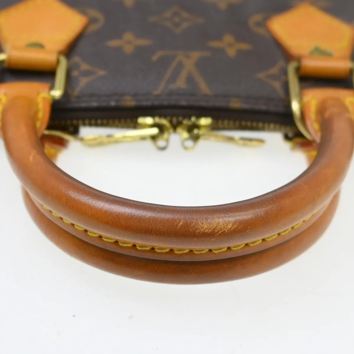 Louis Vuitton Alma Handbag Monogram Canvas Brown Canvas Handbag (Pre-Owned)