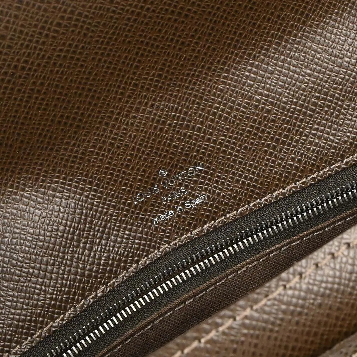 Louis Vuitton Belaia Clutch Taiga Leather Brown Leather Clutche & Pouche Bag (Pre-Owned)