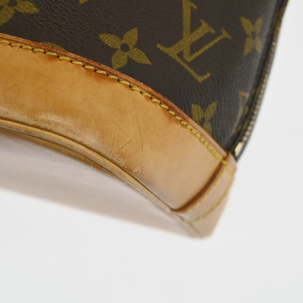 Louis Vuitton Alma Monogram Canvas Brown Canvas Handbag (Pre-Owned)