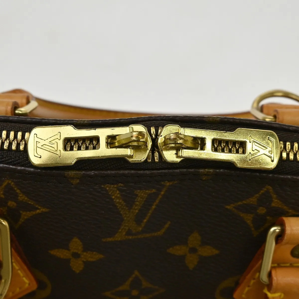 Louis Vuitton Alma Handbag Monogram Canvas Brown Canvas Handbag (Pre-Owned)