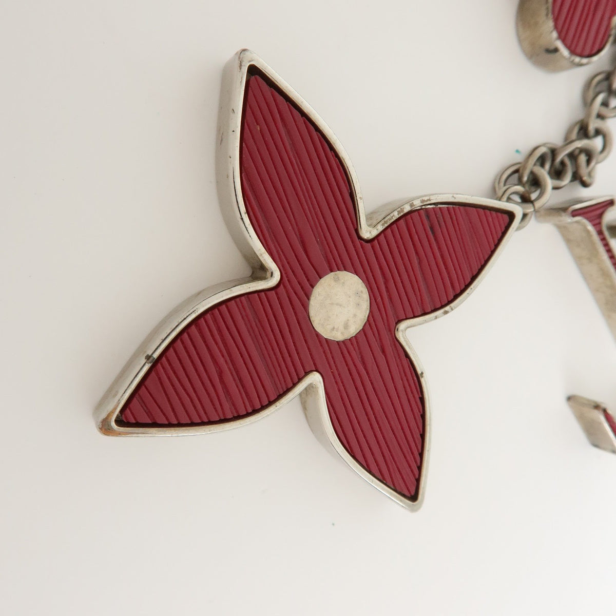 Louis Vuitton Fleur D'epi Bag Charm Resin And Brass Burgundy Metal Charms And Keychains Accessory (Pre-Owned)