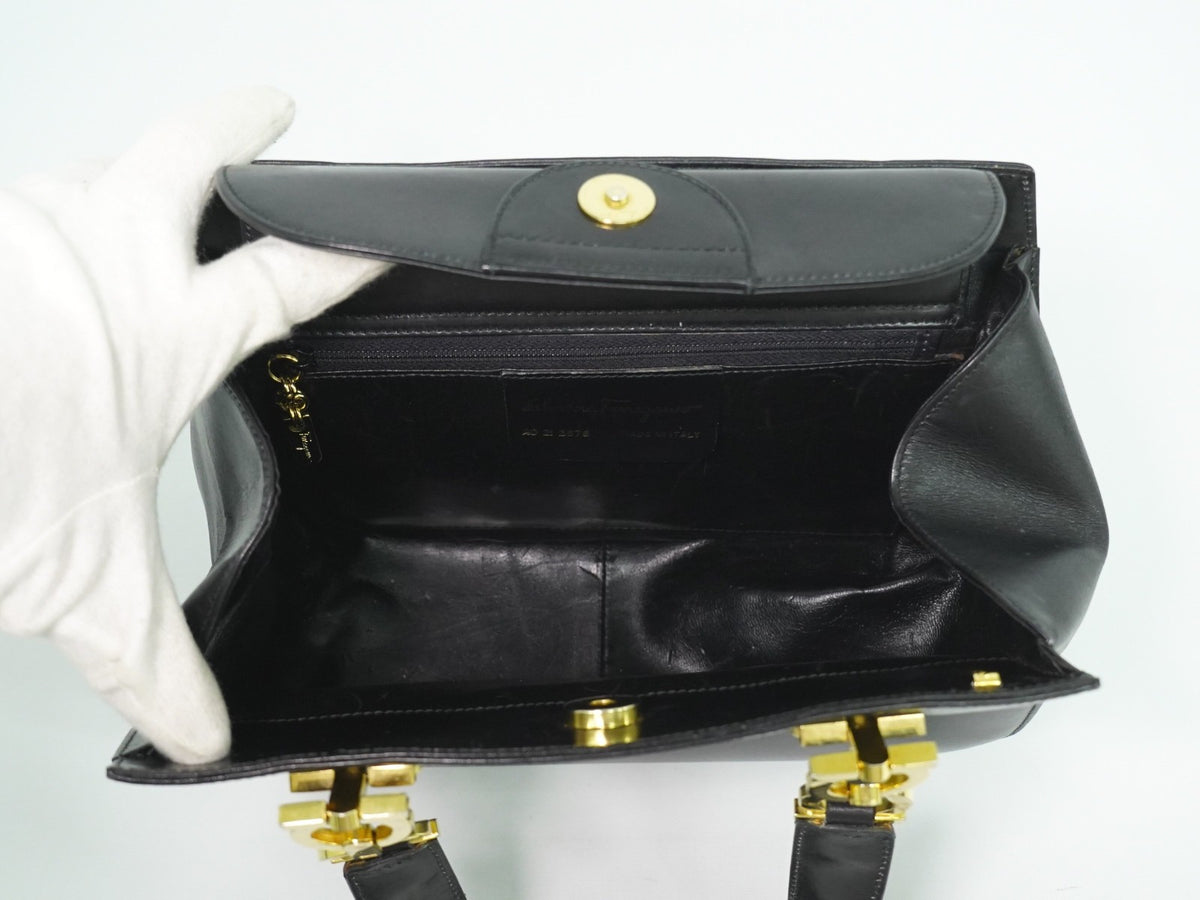 Salvatore Ferragamo Gancini Top Handle Leather Black Leather Handbag (Pre-Owned)