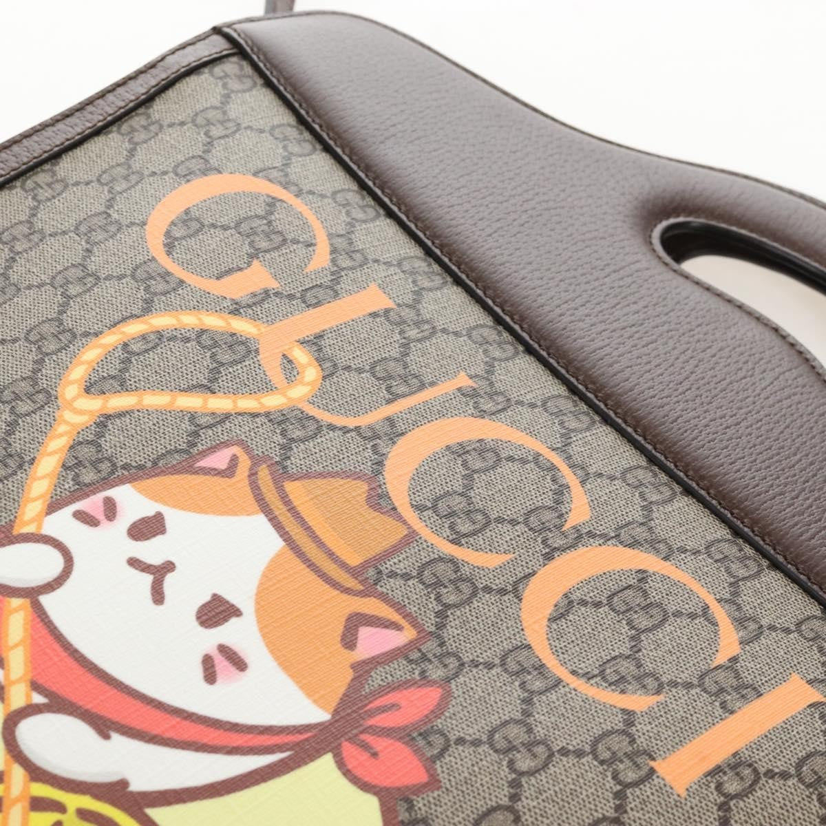 Gucci Cut Out Handle Printed Gg Coated Canvas Brown Canvas Tote Bag Bag (Pre-Owned)