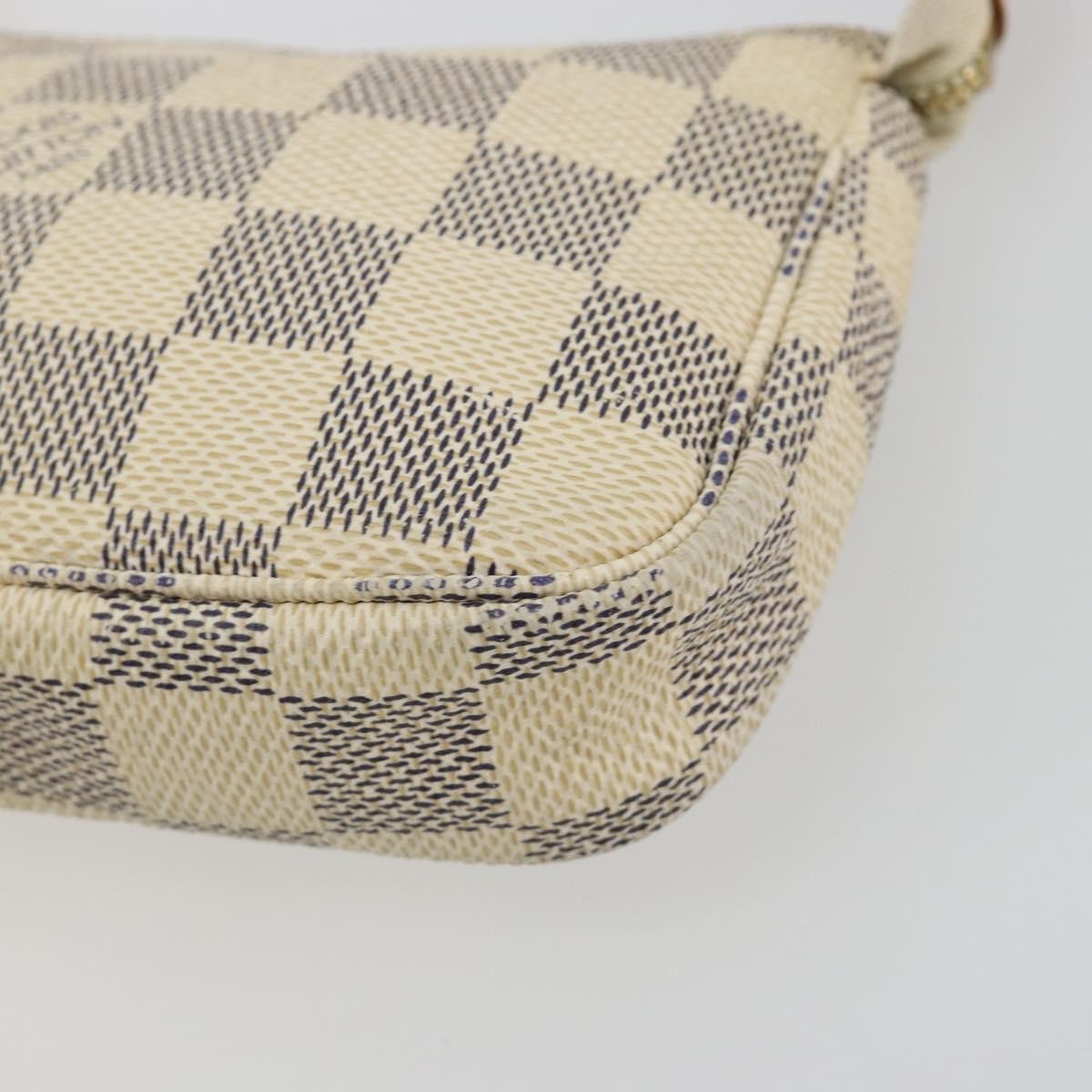 Louis Vuitton Mini Pochette Accessoires Damier Canvas Beige Canvas Clutche & Pouche Bag (Pre-Owned)
