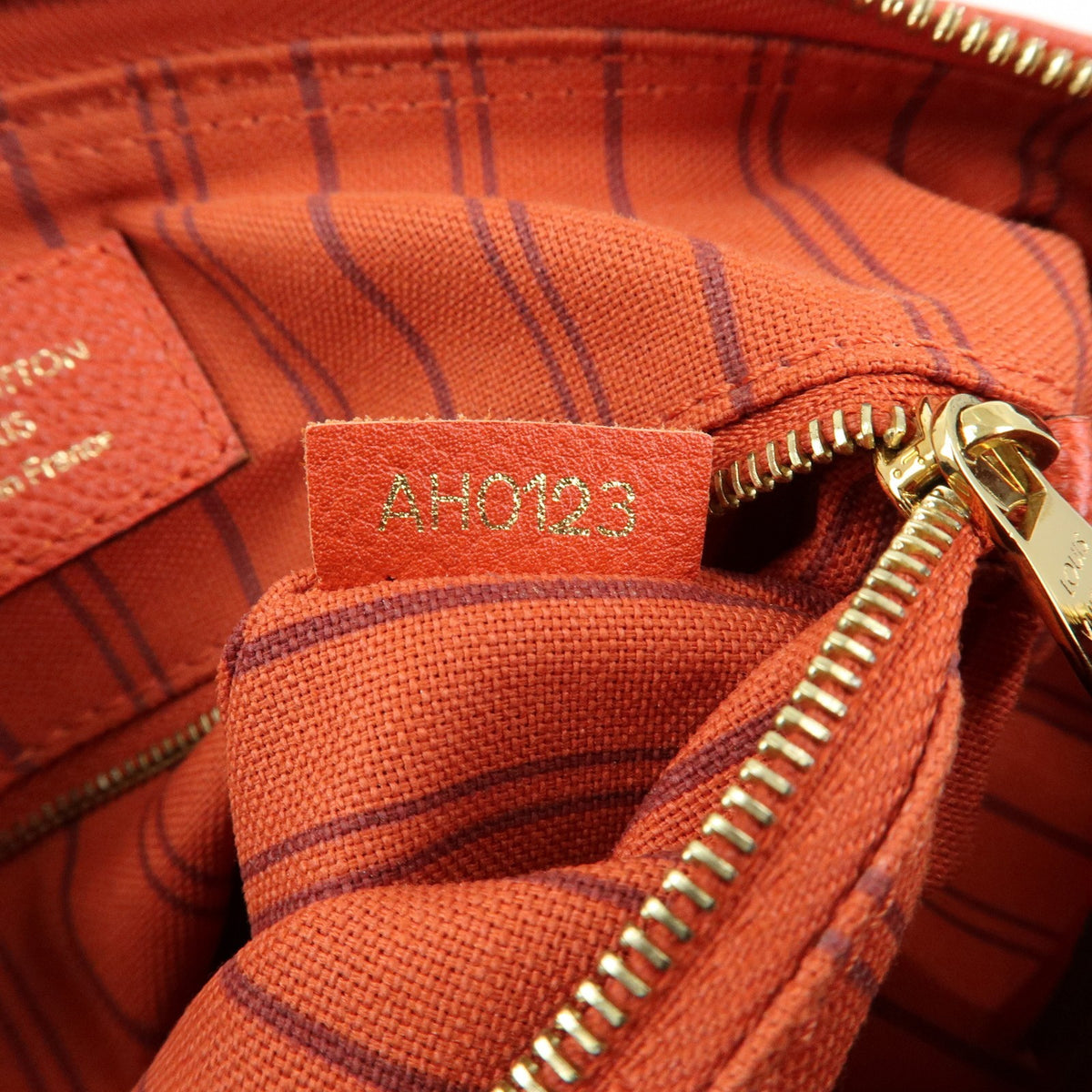 Louis Vuitton Speedy Bandouliere Monogram Empreinte Leather Orange Leather Handbag (Pre-Owned)