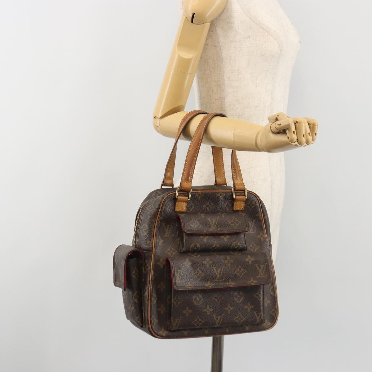 Louis Vuitton Excentri-Cite Monogram Canvas Brown Canvas Handbag (Pre-Owned)
