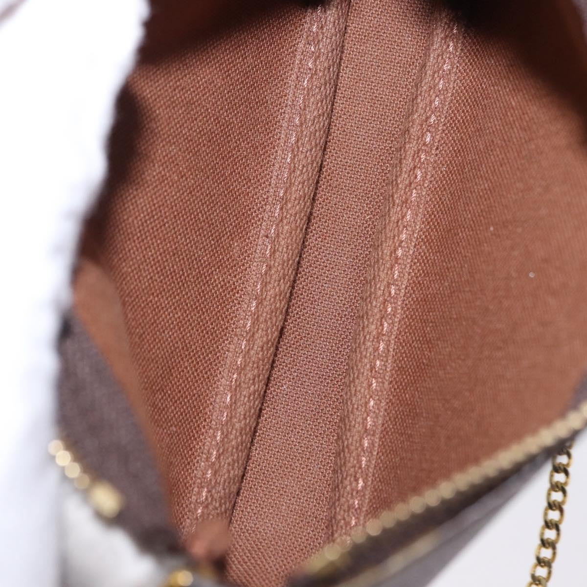 Louis Vuitton Mini Pochette Accessoires Canvas Brown Canvas Clutche & Pouche Bag (Pre-Owned)