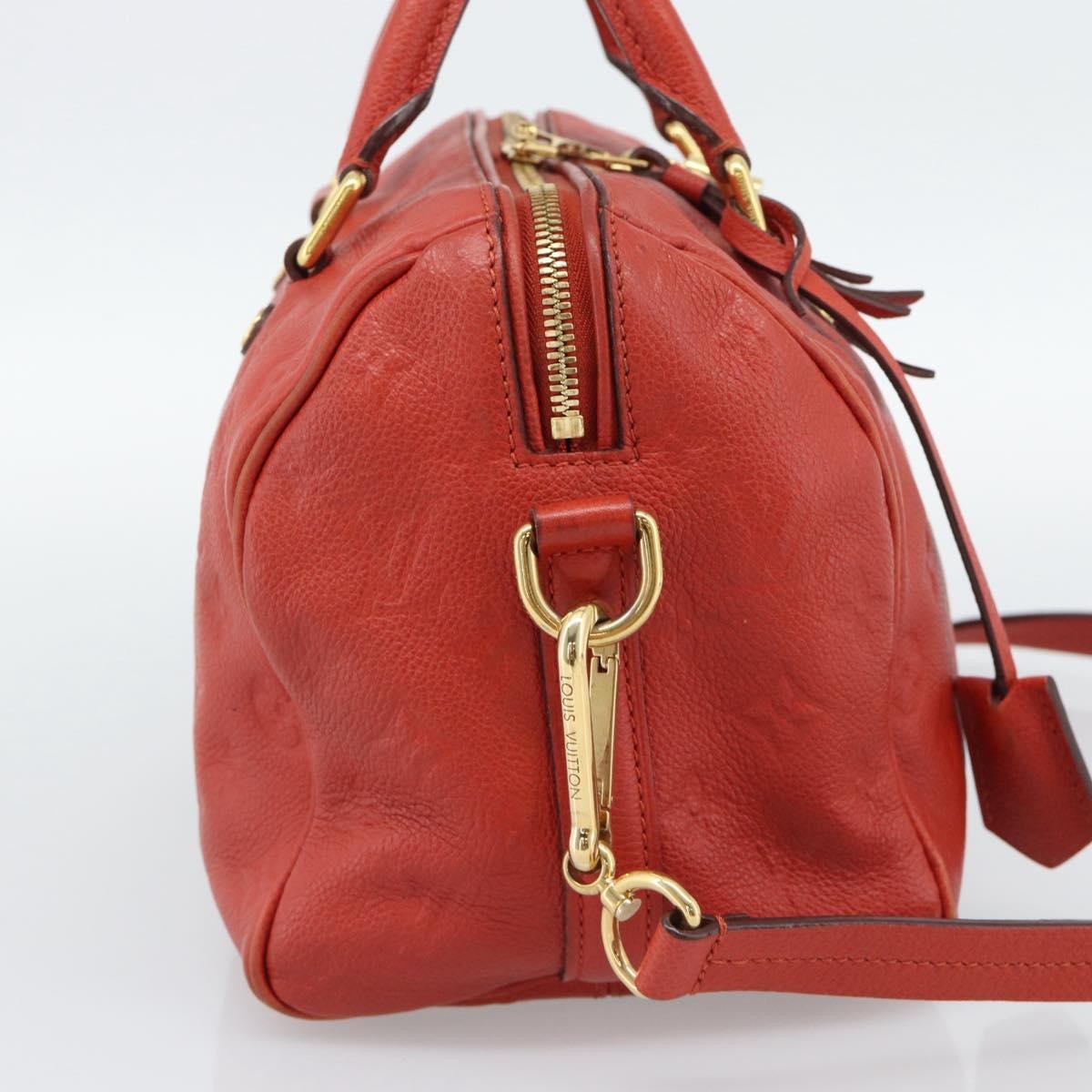 Louis Vuitton Speedy Bandouliere Monogram Empreinte Leather Red Leather Handbag (Pre-Owned)