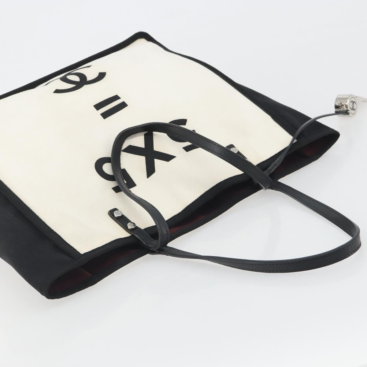Chanel Let's Demonstrate Canvas Beige Canvas Tote Bag Bag (Pre-Owned)