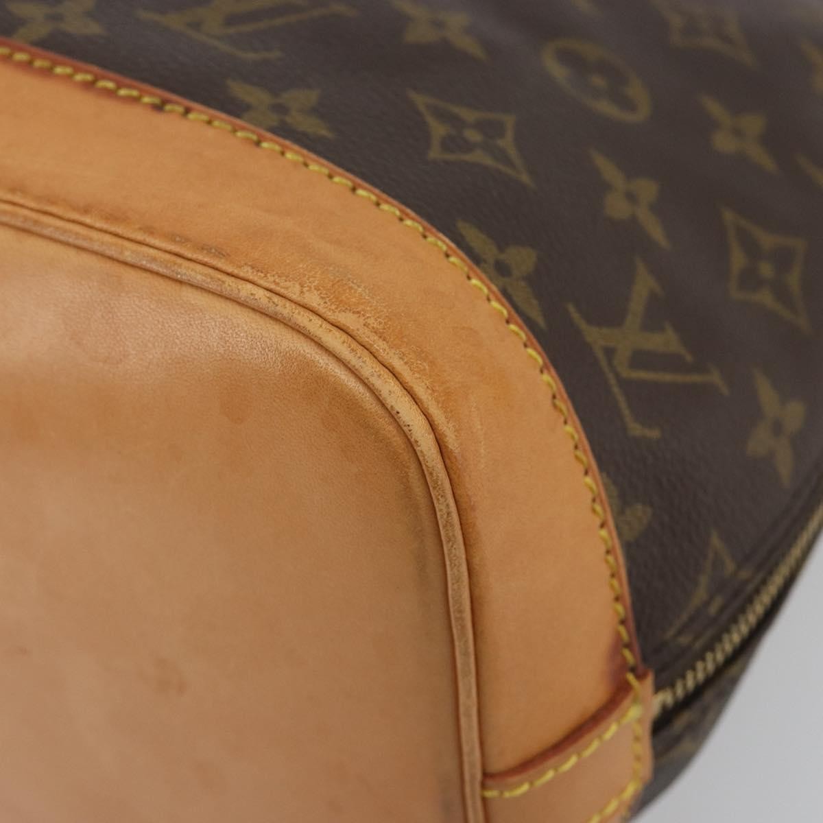 Louis Vuitton Alma Monogram Brown Canvas Handbag (Pre-Owned)