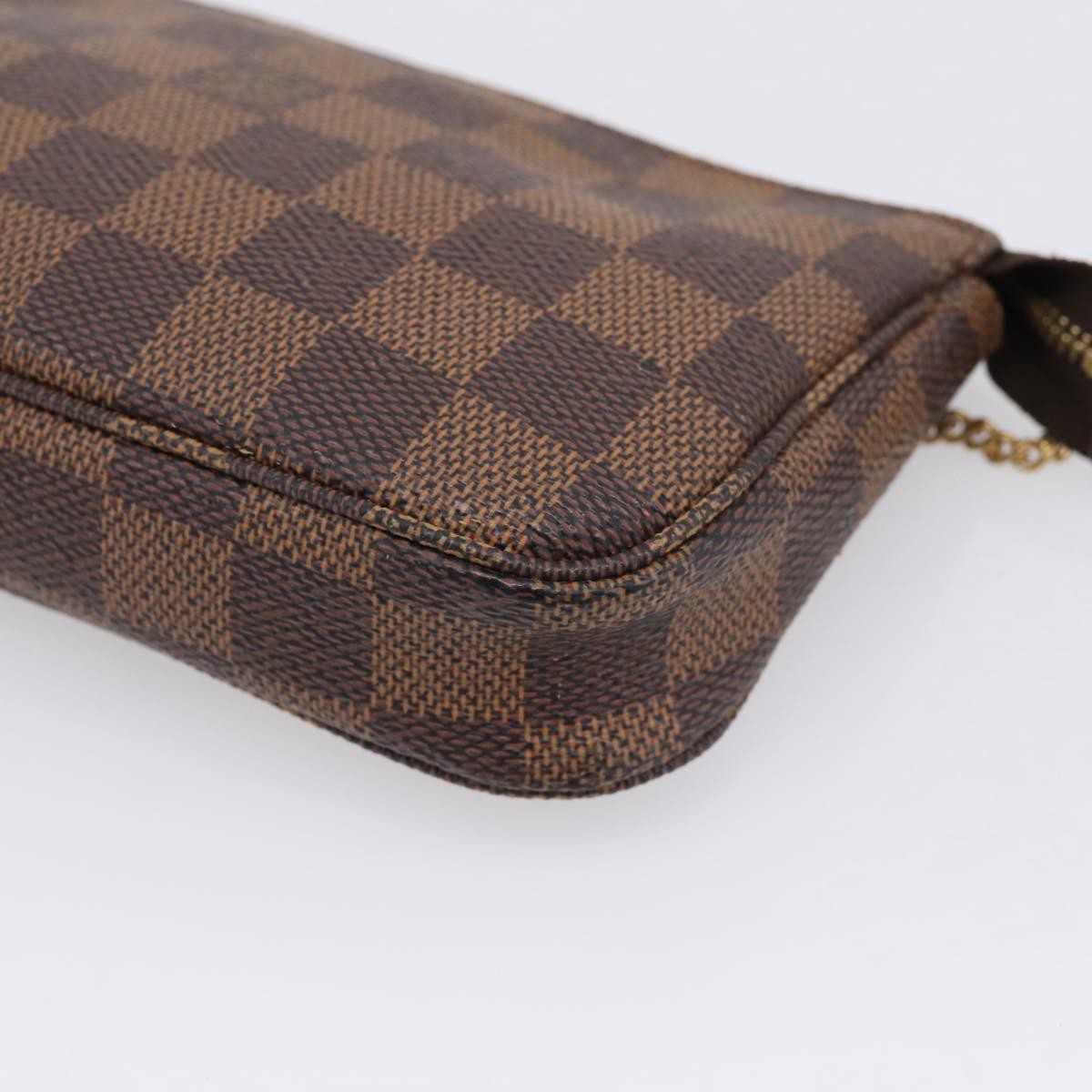 Louis Vuitton Mini Pochette Accessoires Damier Canvas Brown Canvas Clutche & Pouche Bag (Pre-Owned)